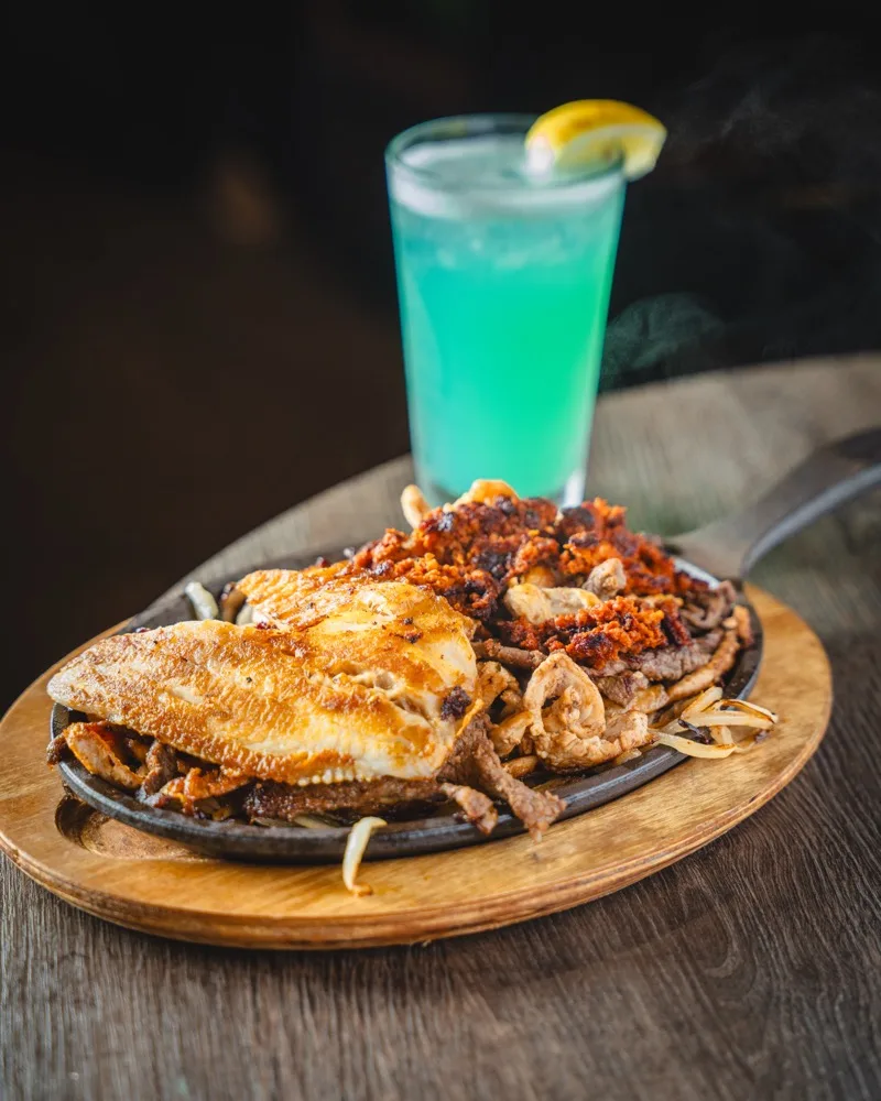 Sizzling fajitas at El Metate
